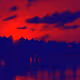 Red of the Resort Sunset as Bungalows Blend into the Ocean