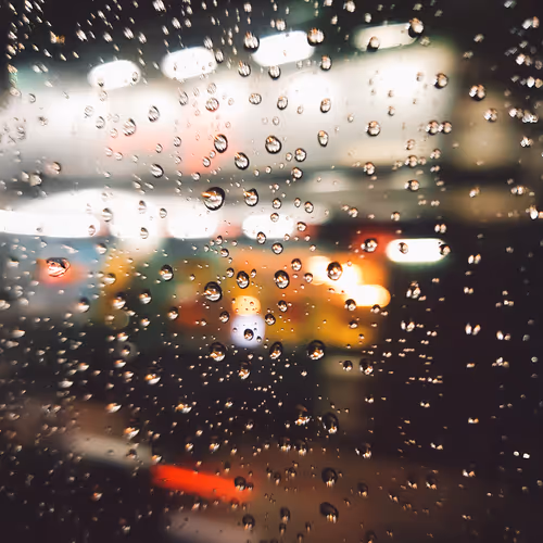 Raindrops and Neon Dreams: A Drunken Journey