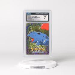 1999 Pokémon the First Movie #E2 No.02 Ivysaur - First Print (Blue Topps Logo) (CGC 7 NM)